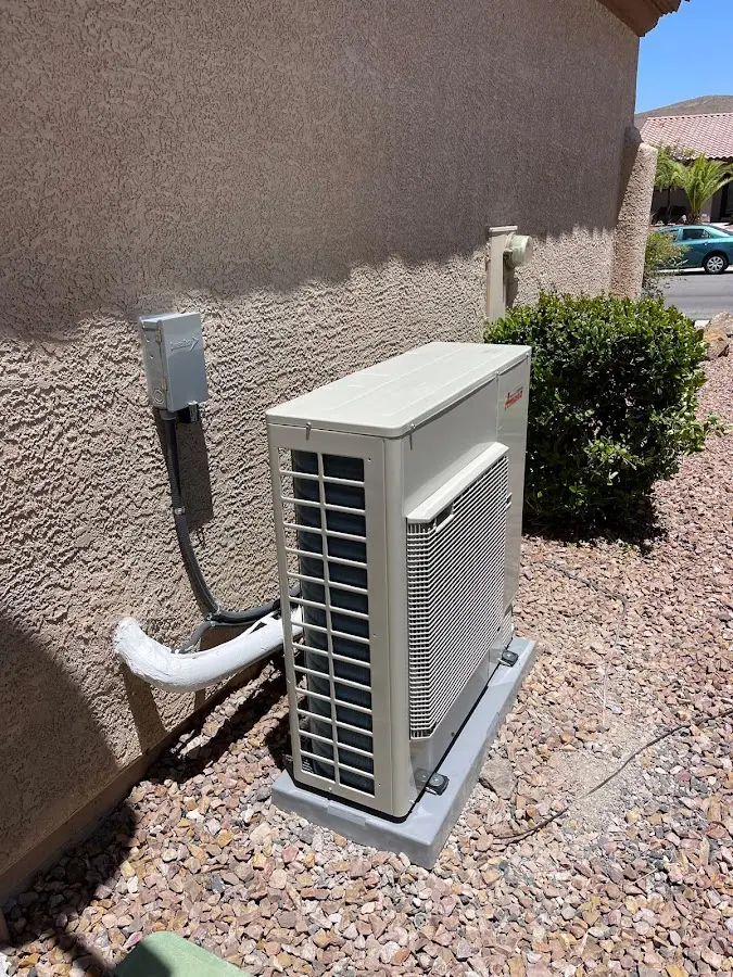Residential air conditioning condenser unit in Wailea